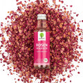 babaGOURMET Mansuris BIO Rosenwasser 100ml glass bottle with pink label, natural rose water for flavoring food and drinks.