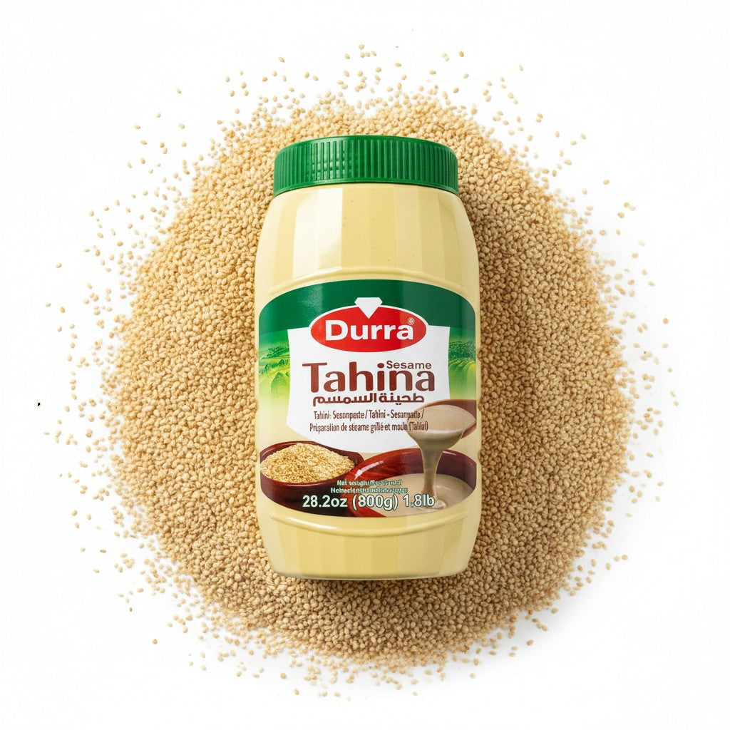babaGOURMET Durra Original Tahine sesame paste in a yellow plastic jar with a green lid. Features Arabic and English text.