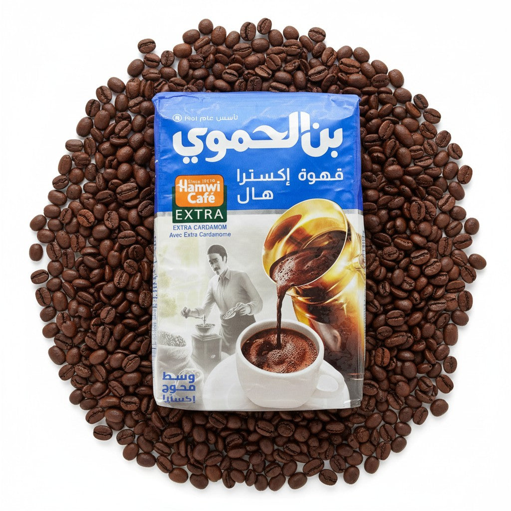 babaGOURMET Hamwi Arab Mokka ground coffee with extra cardamom, 450g bag. Features traditional preparation illustration.