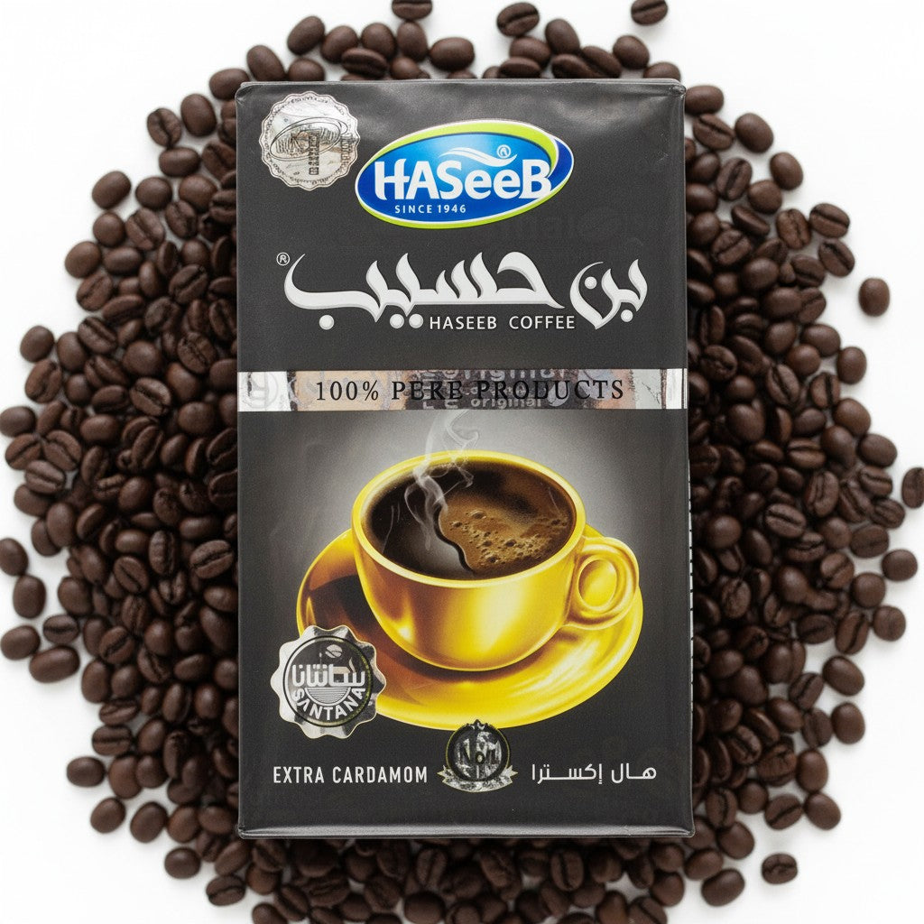 babaGOURMET Haseeb ground Arabic coffee with extra cardamom, 500g bag featuring a steaming cup of coffee.