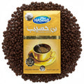 babaGOURMET Haseeb ground Arabic coffee with super extra cardamom, 500g bag. Features a steaming cup of dark coffee on a saucer.