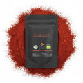 baba GOURMET organic sumac powder, 60g pouch. A dark pouch with a label featuring the brand name, 'Sumach' in red, and organic certifications.